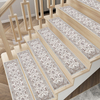 Washable stair pads bending at corner on wooden steps