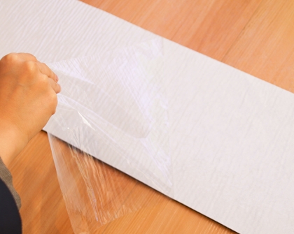 Self adhesive stair mat