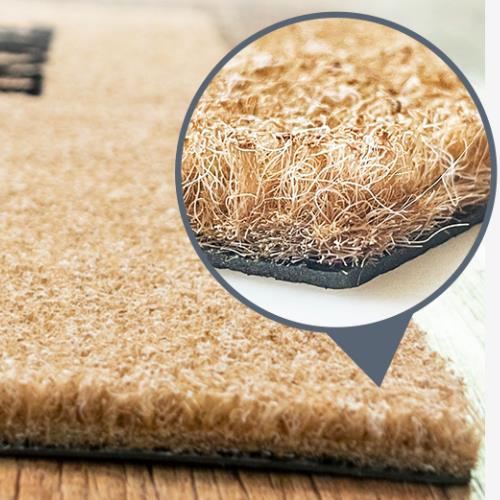 Close up of the surface of the imitation coconut palm door mat