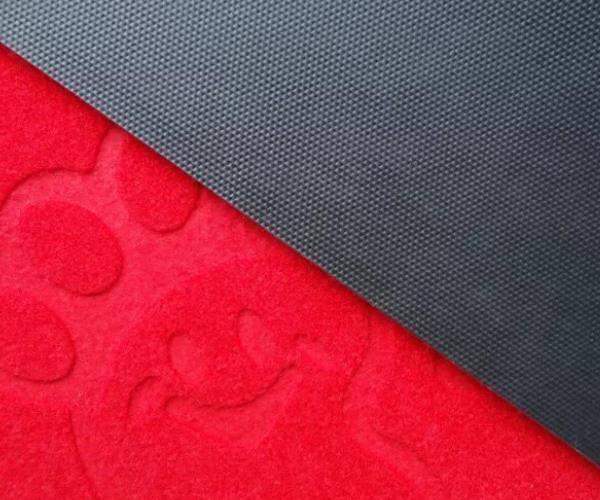 Close up of brushed embossed door pad backing