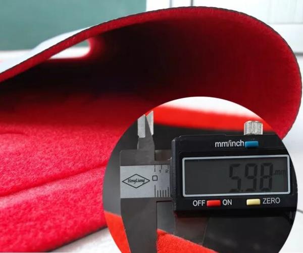 Display of thickness of brushed embossed door mat