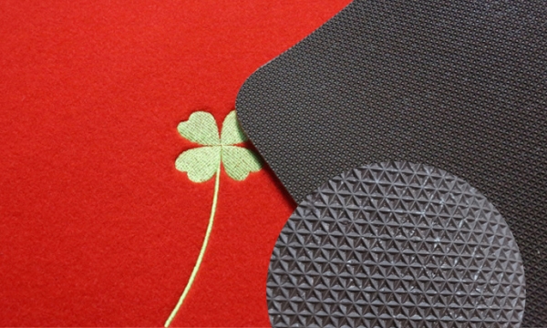 Embroidered door mat back